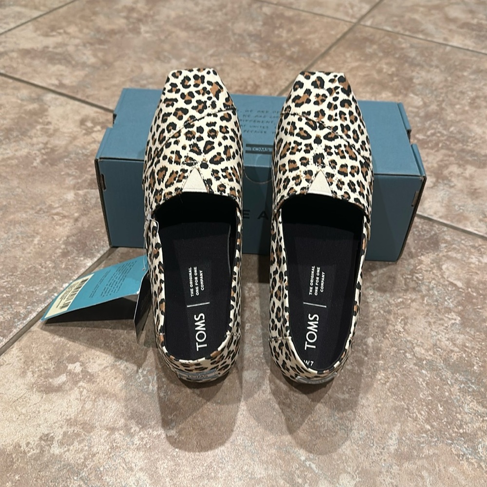 Tom’s Leopard print slip ons